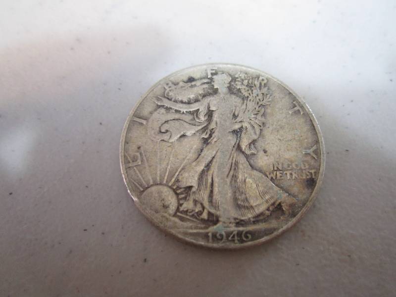 lot 244 image: 1946 half dollar...