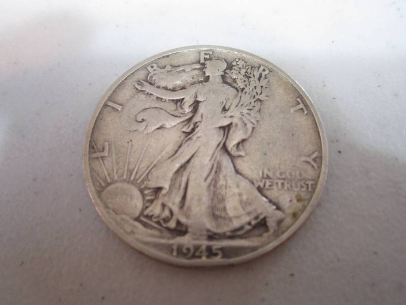 lot 247 image: 1945 S half dolar...