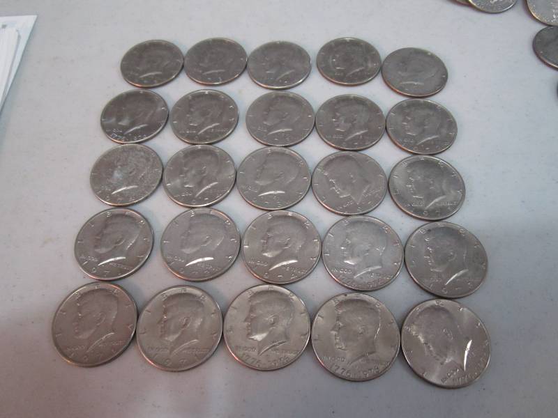 lot 252 image: 25 half dollars...
