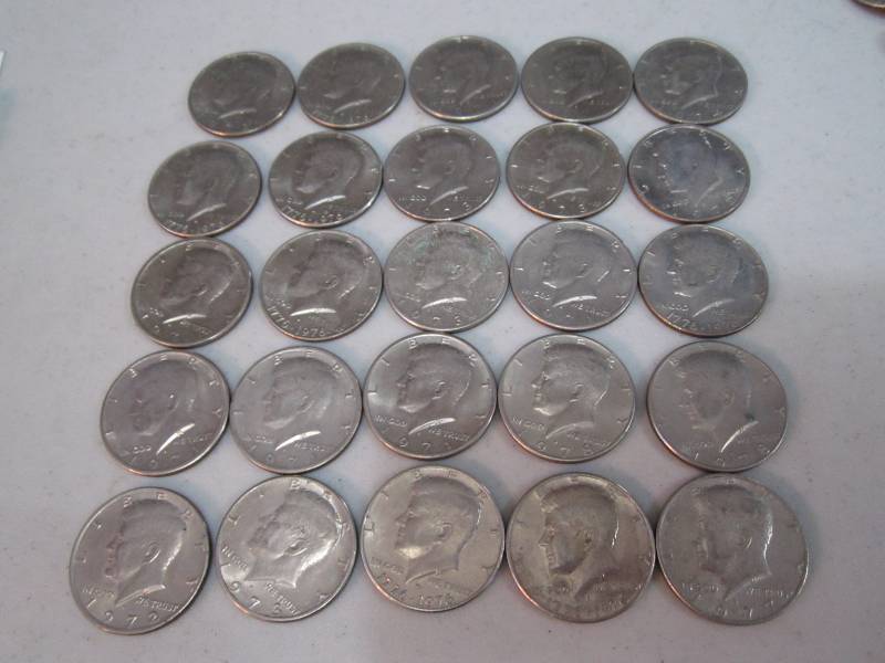 lot 253 image: 25 half dollars...