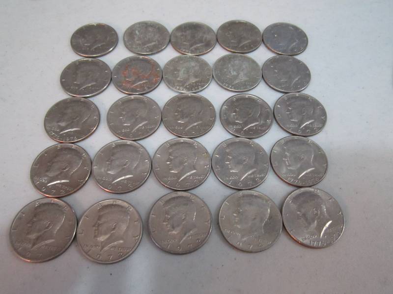 lot 254 image: 25 half dollars...