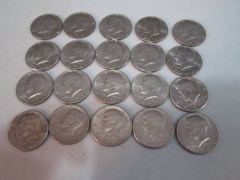 lot 256 image: 20 half dollars...