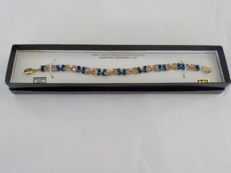 lot 1 image: 18 karat  Gold over Sterling Silver...