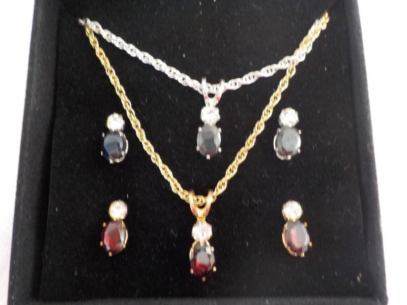 lot 27 image: Sapphires Garnet and Genuine CZs...