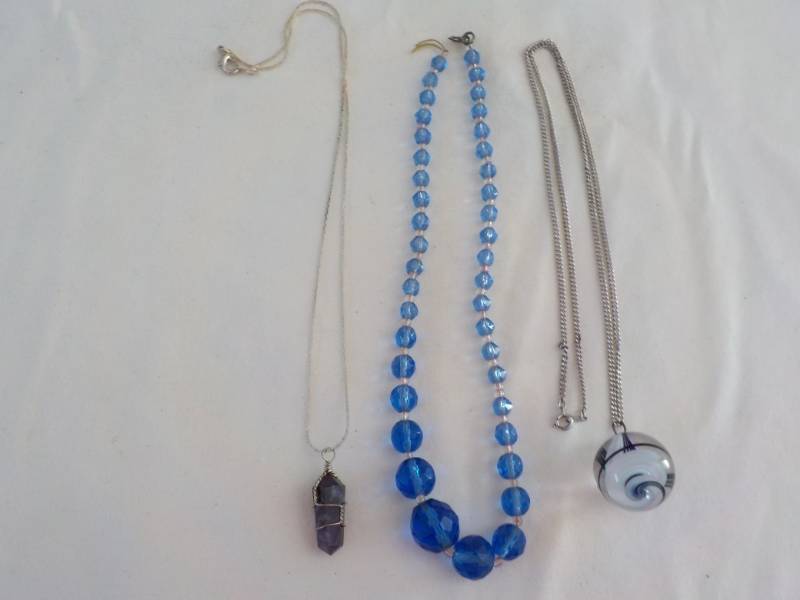 lot 33 image: Glass Marble with 925 chain and Ant...