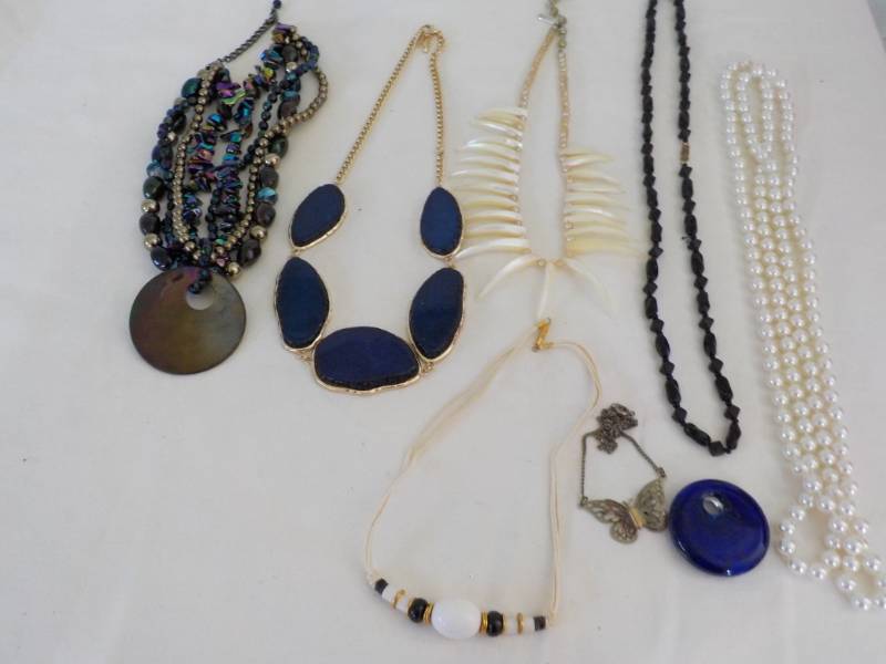 lot 52 image: Necklaces...