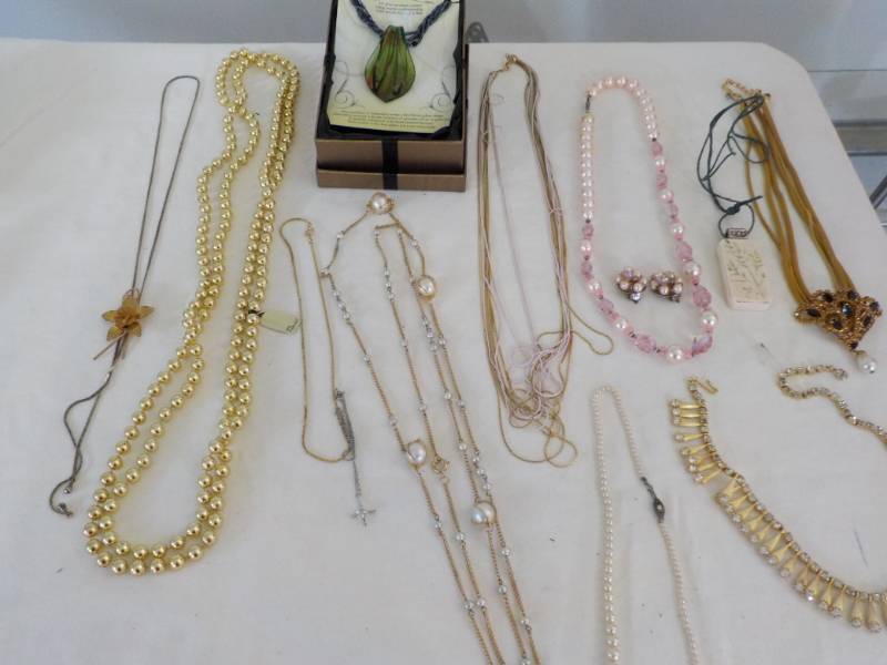 lot 55 image: Necklaces...