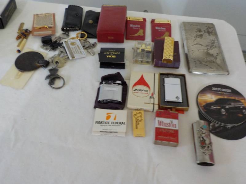 lot 68 image: Cigarette Lighters, Keys- cigarette...