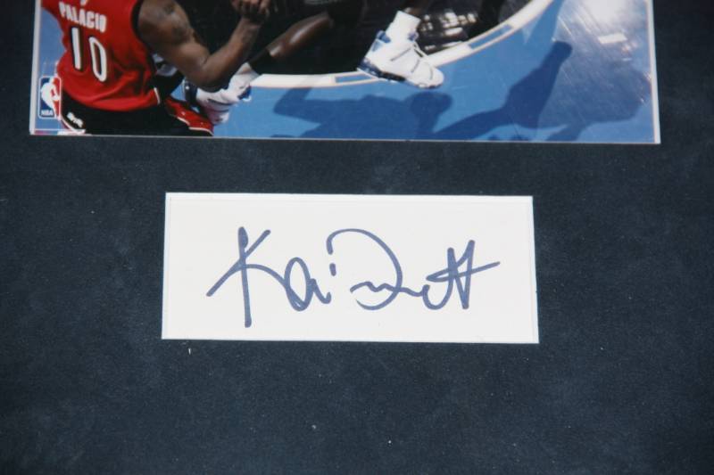 lot 58 image: Kevin Garnett Framed Photo with Cut Auto