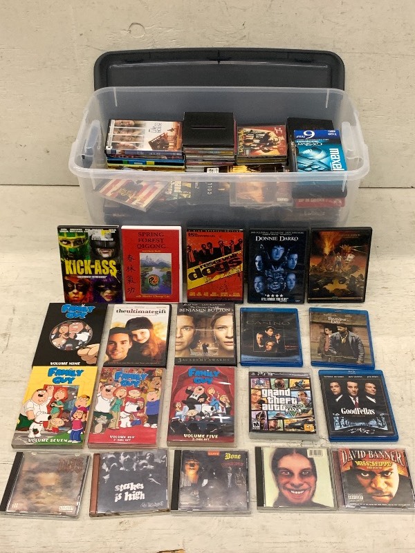 lot 14 image: Tote Of Assorted DVD & VHS Movies, Etc