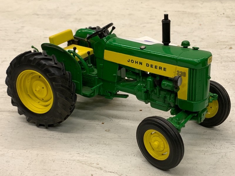 lot 69 image: John Deere 330 Tractor ...