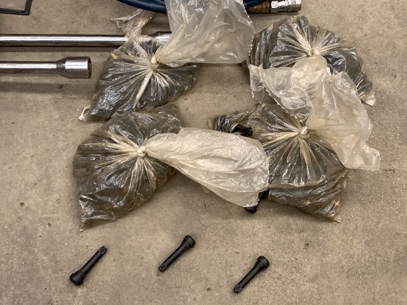 lot 24 image: Air Hose, Valve Stems, Spreed Wrenches, Etc