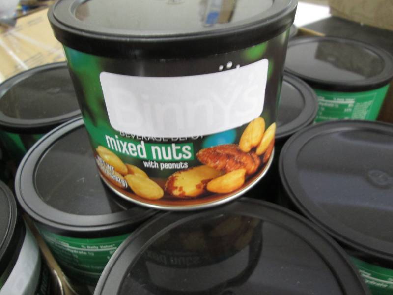lot 242 image: Case of 12 -10.3 oz Cans Mixed Nuts...