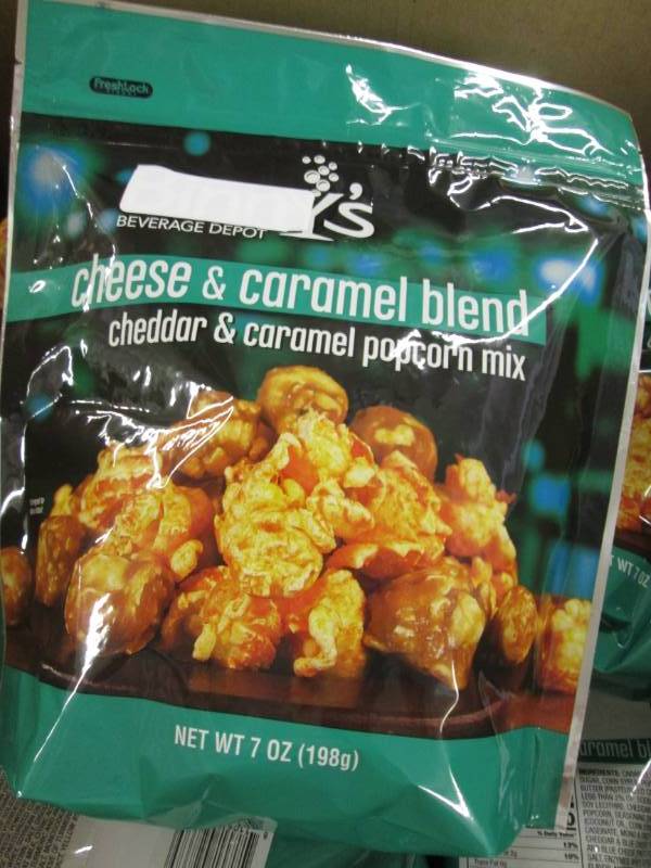 lot 257 image: Case of 12-7 oz Bags Cheese & Caram...
