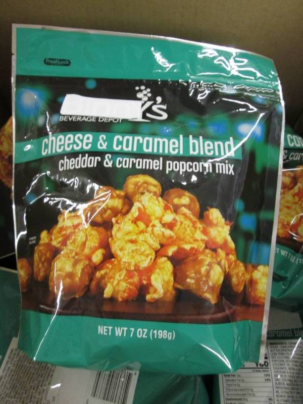 lot 259 image: Case of 12-7 oz Bags Cheese & Caram...
