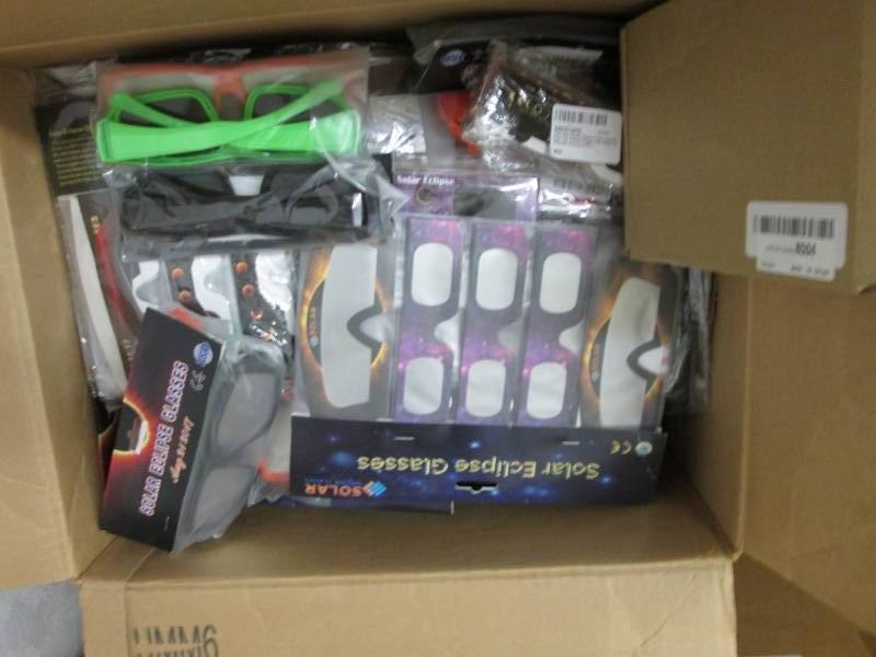 lot 105 image: Box of Solar Eclipse Glasses...