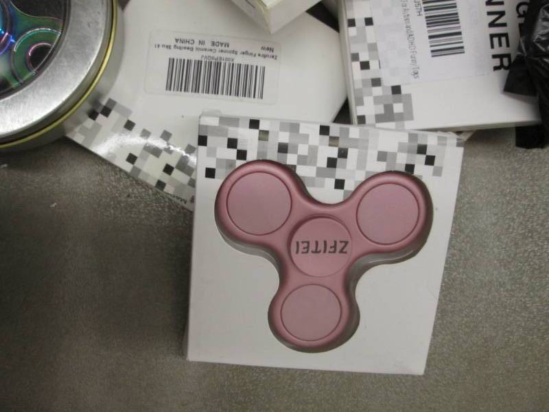 lot 139 image: Lot of 12 Fidget Spinners...