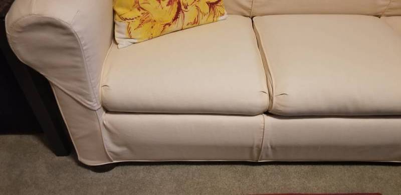 lot 21 image: Stearns and Foster Slip Covered Sleeper Sofa