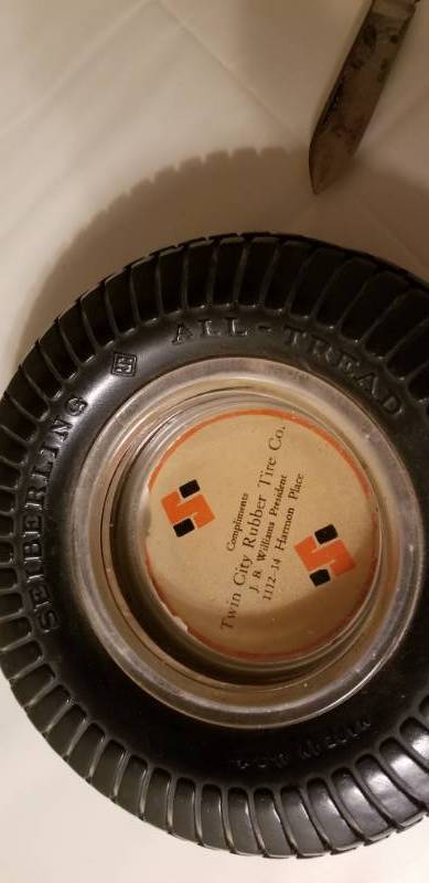 lot 105 image: Vintage Straight Razors and Rubber Tire Ashtray