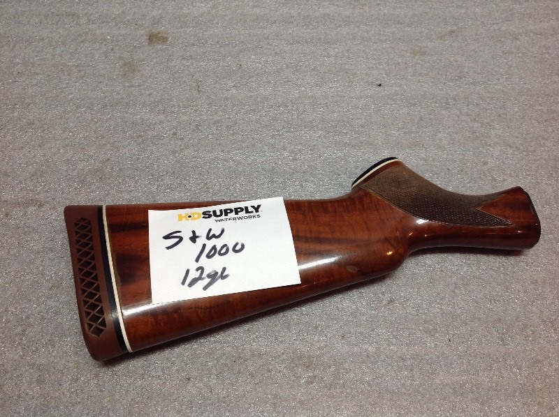 lot 23 image: S & W 1000 12 Gauge Stock