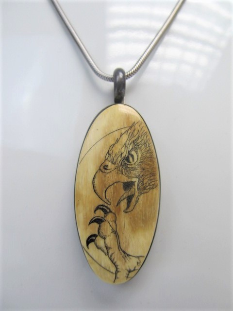 lot 19 image: Large Signed Vintage Etched Bone & Sterling Silver Pendant Necklace