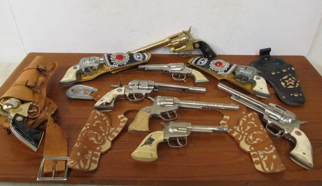 lot 115 image: Large Lot of Vintage Western Toy Cap Guns Holsters etc (AS IS)