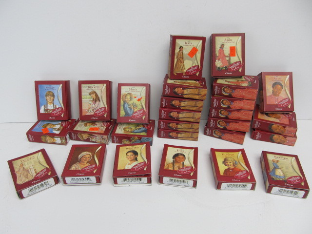 lot 189 image: Large Lot of New In Box AMERICAN GIRL Charms