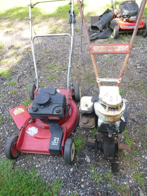 lot 28 image: Toro Lawn Mower and Garden Tiller