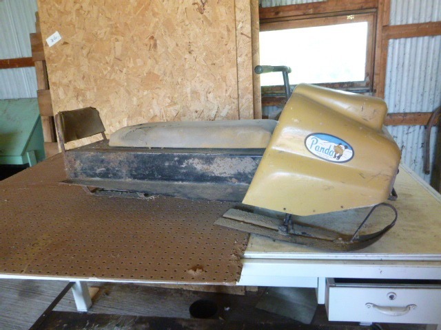 lot 55 image: Vintage Panda Pull Behind Sled