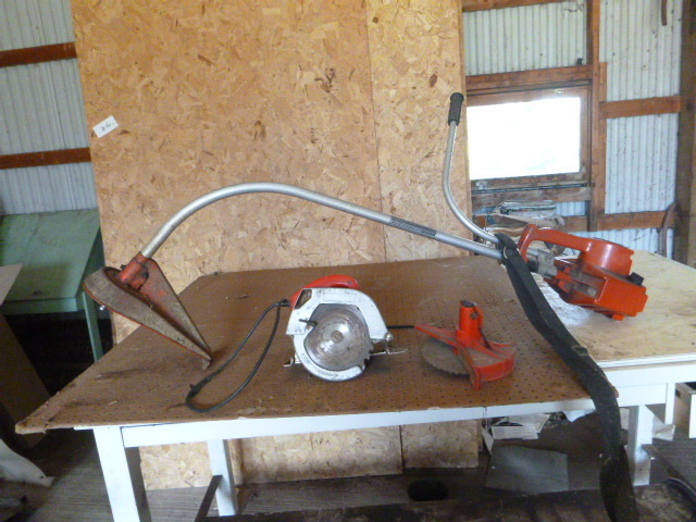 lot 76 image: Weed Whip and Skill Saw
