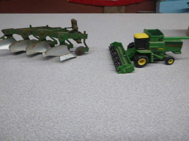 lot 305 image: John Deere Die-Cast Combine and 4-Bottom Plow
