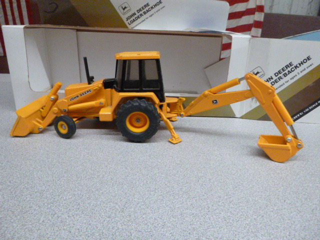 lot 306 image: Ertl John Deere Die-Cast LoaderBackhoe