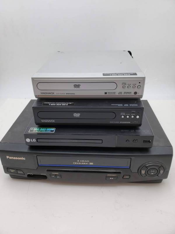 lot 4 image: Lot of 3 DVD Players and a VCR