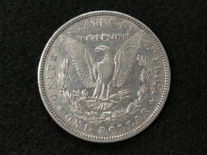 lot 7 image: 1879 Morgan Silver Dollar...