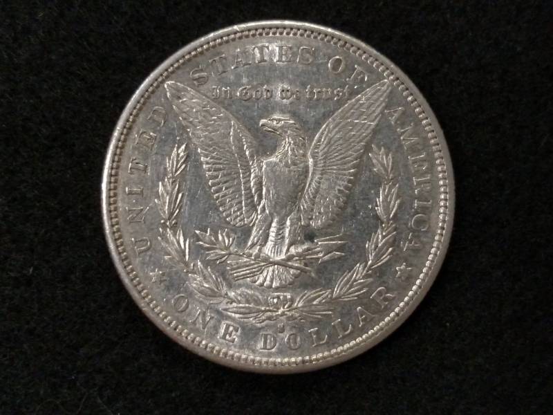 lot 14 image: 1882 S Morgan Silver Dollar...