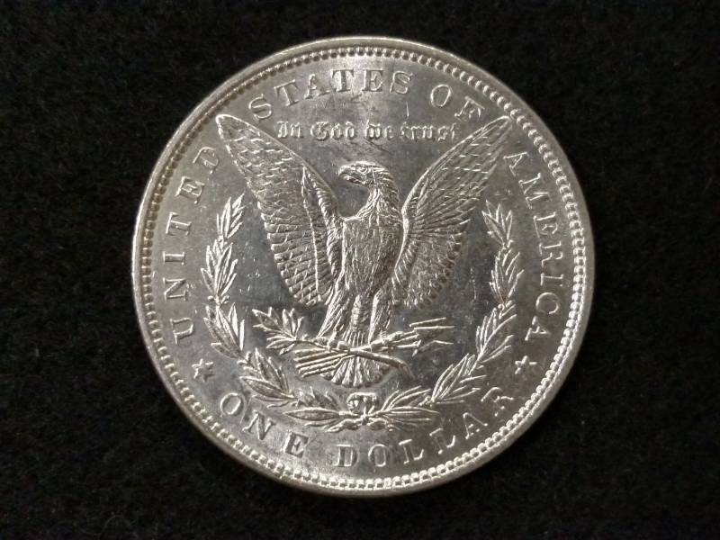 lot 17 image: 1884 MS  Morgan Silver Dollar...