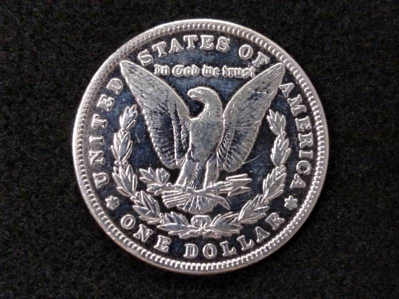lot 19 image: 1885 Morgan Silver Dollar...