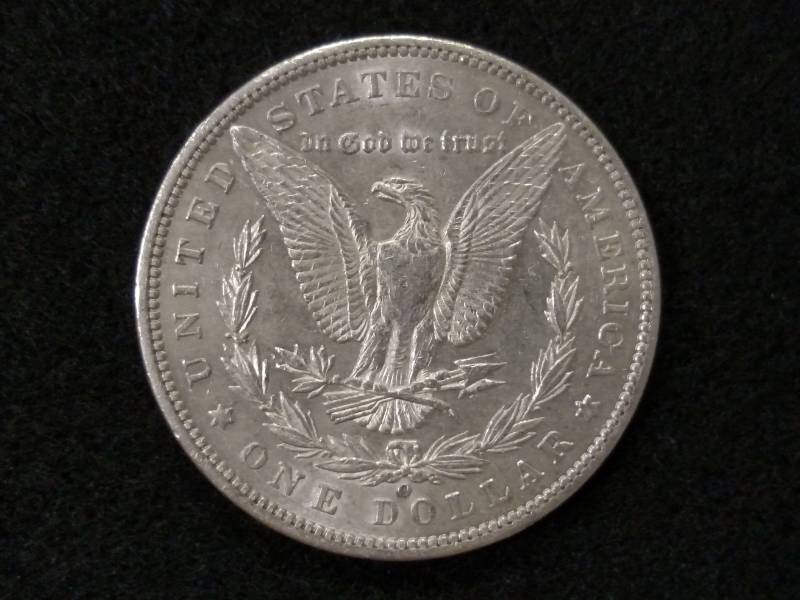 lot 21 image: 1886 O Morgan Silver Dollar...