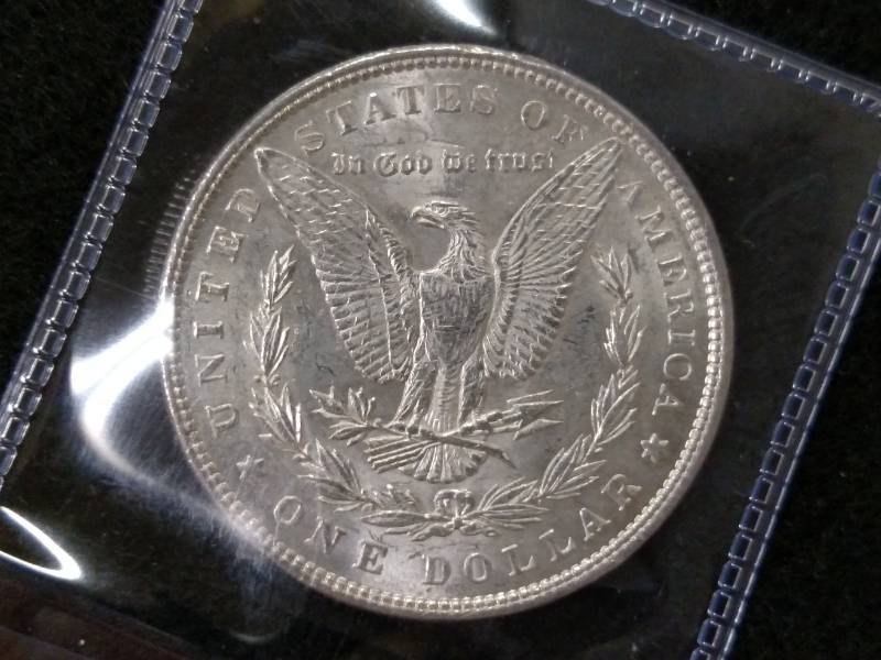 lot 34 image: 1897 MS  Morgan Silver Dollar...