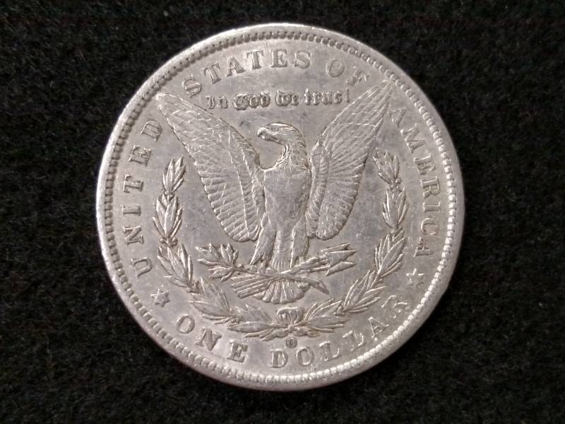 lot 38 image: 1899 O Morgan Silver Dollar...