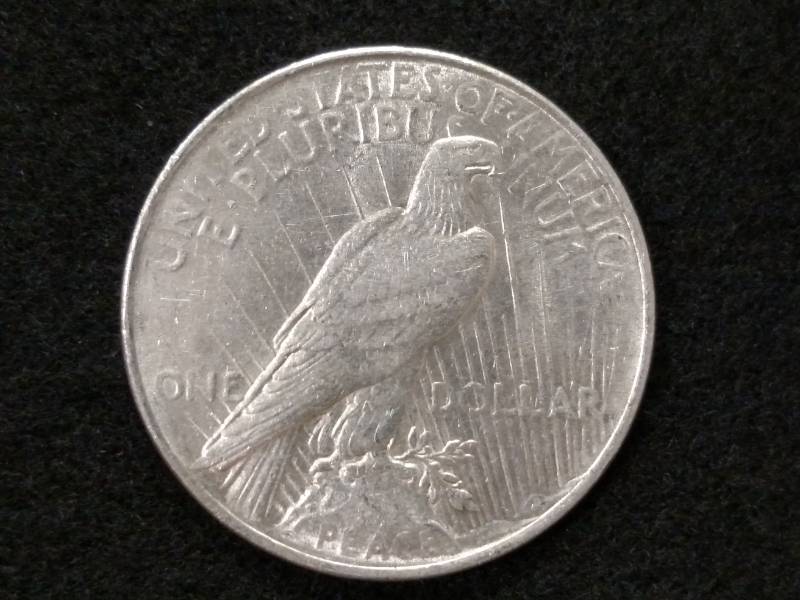 lot 55 image: 1922 Peace Silver Dollar...