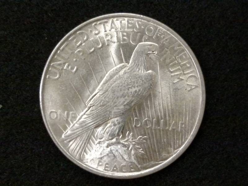 lot 57 image: 1922 Peace Silver Dollar...