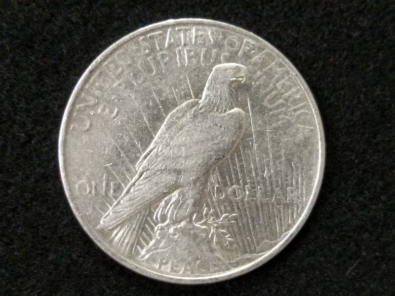 lot 62 image: 1922 Peace Silver Dollar...