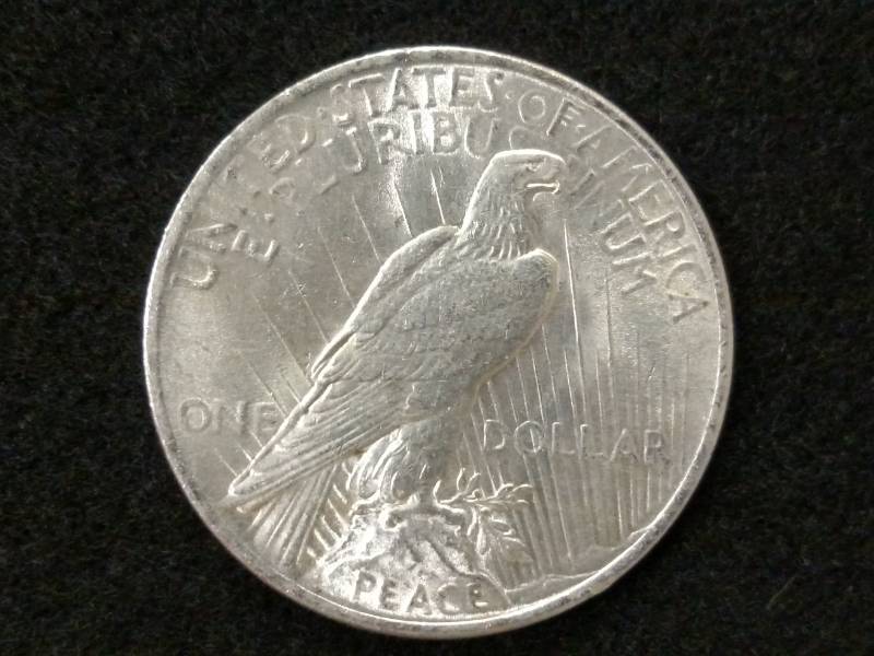 lot 64 image: 1922 Peace Silver Dollar...