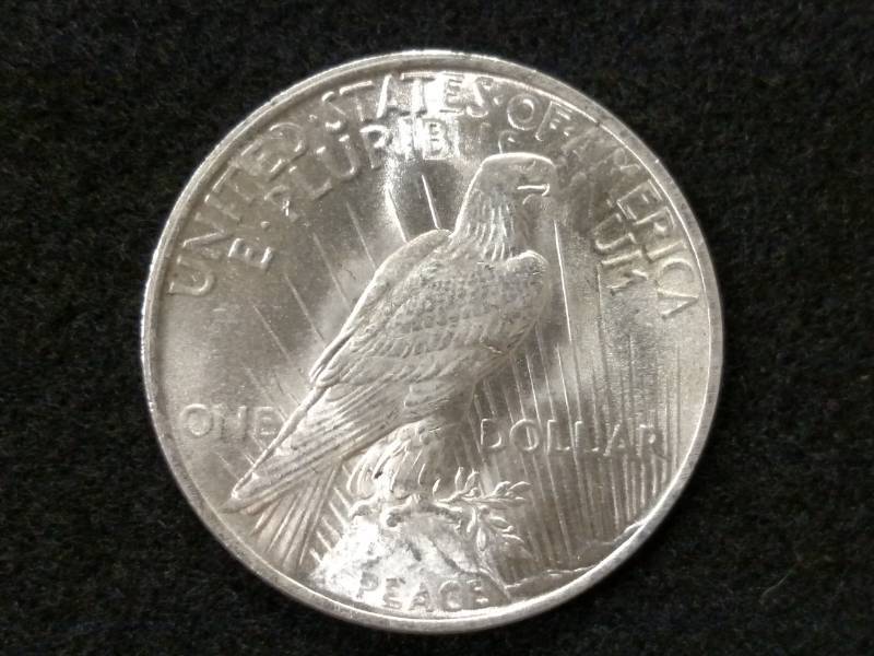 lot 76 image: 1923 Peace Silver Dollar...