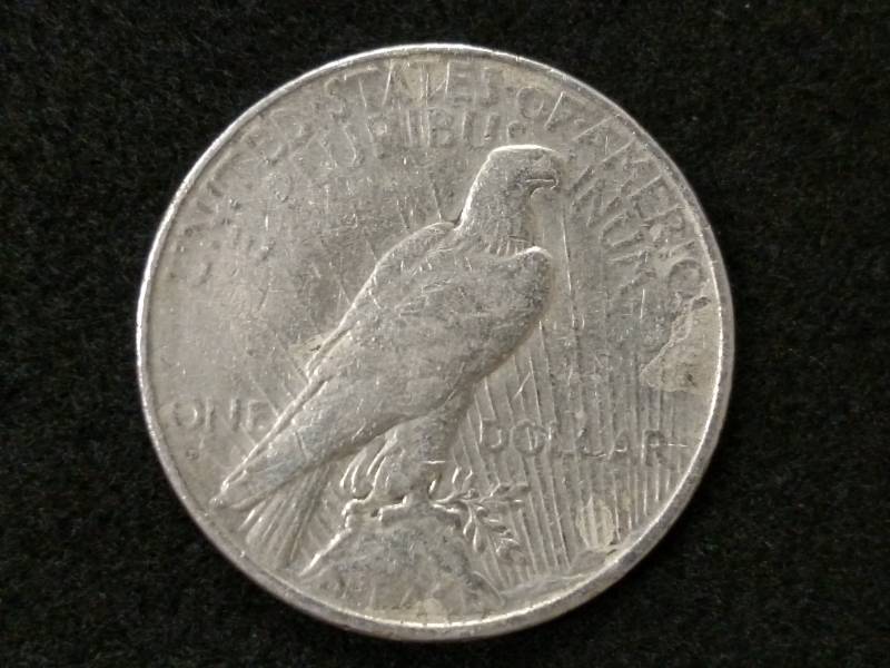 lot 112 image: 1934 D Peace Silver Dollar...