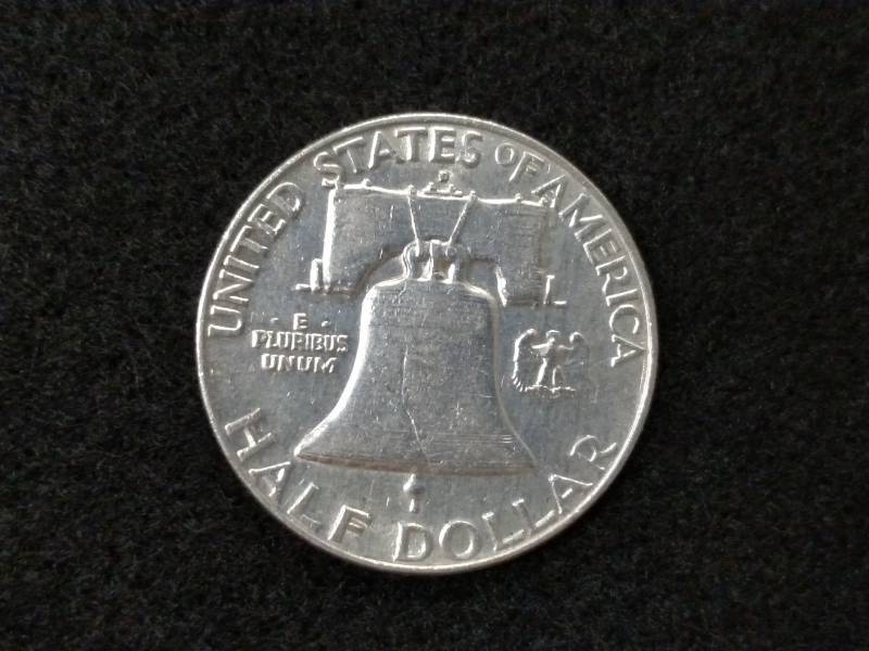 lot 125 image: 1957 D Franklin Silver Half Dollar...