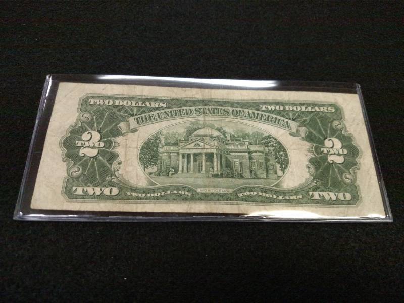 lot 185 image: 1928 F Two Dollars Red Seal Note...