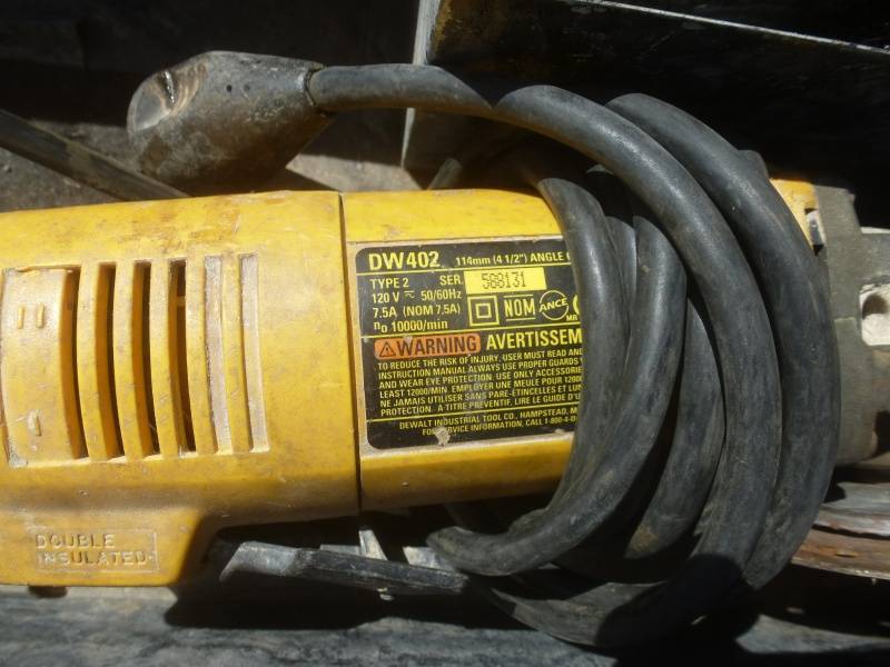 lot 13 image: Dewalt 4 12 grinder