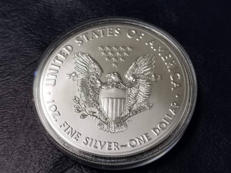 lot 21 image: 2016 AMERICAN SILVER EAGLE 1 TROY OZ. .999 FINE SILVER IN AIRTITE